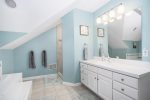 Primary bathroom with both a jetted tub and walk in shower